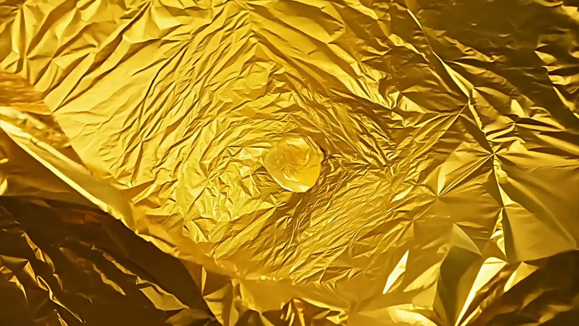 Golden Spiral Crinkled Foil Background for Logo Animation